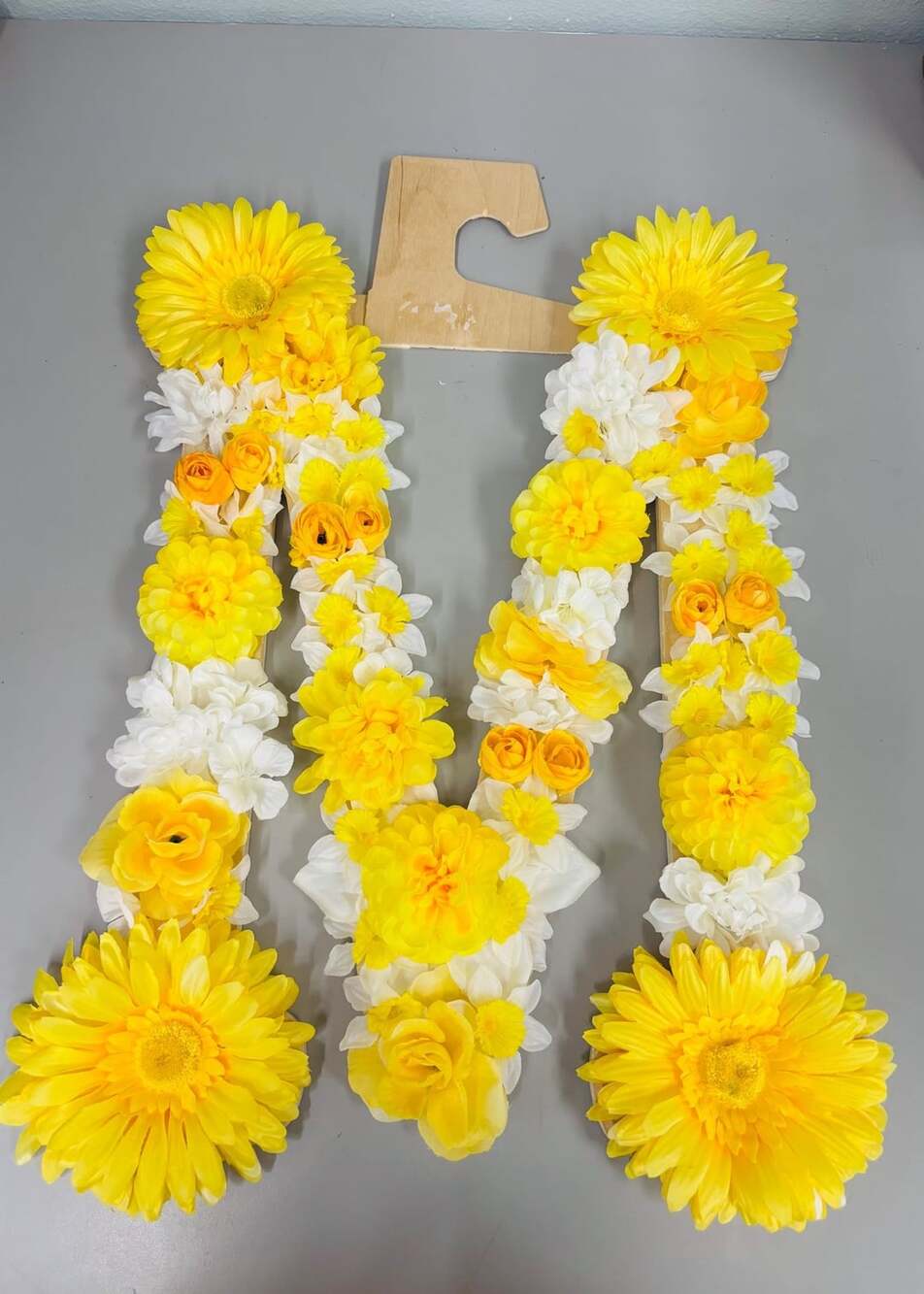 Wooden Letter M Wall Decor Covered in Yellow and White Artificial Flowers